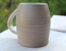 a finished mug, upside-down so it will dry evenly.